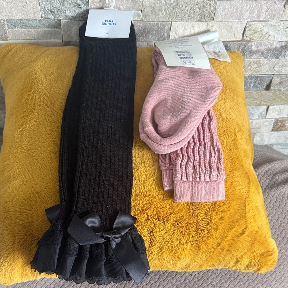 Black and Pink Bow-Trimmed leg warmer and pair of socks